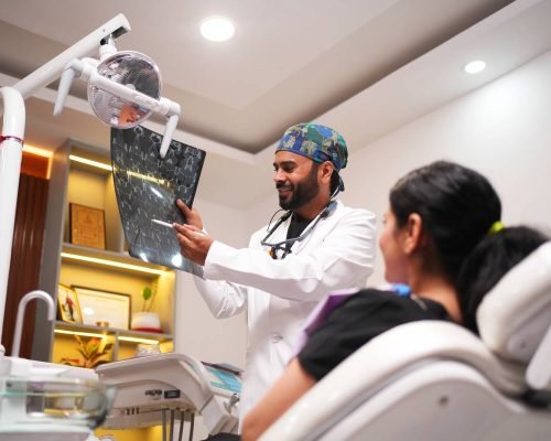 Dr Sombir Singh - Treating Patient at Best Dental Clinic In Chandigarh